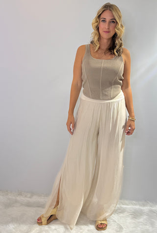 Italian made silk palazzo pants with side slits, full lining and an elastic waistband in black, taupe or beige
