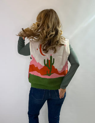 Western knit zip-up sleeveless sweater vest with high neck and pockets in green, cream, rust and blush pink