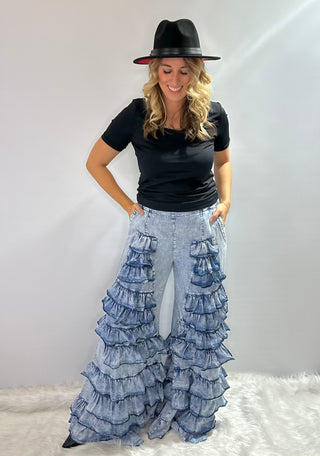 Tiered Ruffle denim bell bottom pants with elastic waistband and retro flare design and side pockets. 
