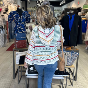 Cozy Boho striped sweater featuring white, red, mustard yellow and green. Soft Knit fabric with a slightly oversized fit, perfect for layering. Ideal for a casual, effortless bohemian look. 