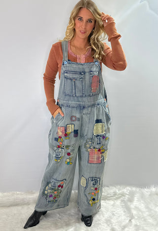 Blue Velvet Wildflower Roads Overalls in vintage-washed denim with boho embroidery, patchwork details, and oversized relaxed fit