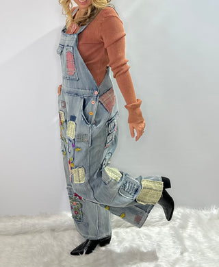 Blue Velvet Wildflower Roads Overalls in vintage-washed denim with boho embroidery, patchwork details, and oversized relaxed fit