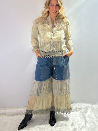 Jacquard crepe button front shacket top with shell buttons in a cream color with relaxed boho fit, pockets and lace hem details 