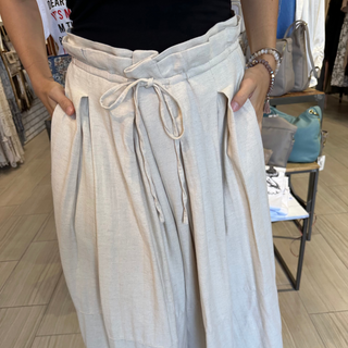Linen wide leg trouser pant with elastic waist and tie front closure and pleated legs