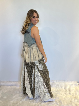 Taupe leopard print wide leg pants with lace and ruffle detailing, elastic waistband, full length exaggerated silhouette and side pockets
