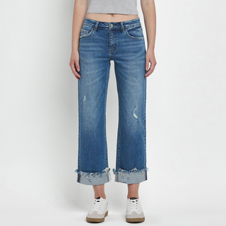 Mid-Rise slim wide-leg jean with a raw cuffed hem, light medium denim wash, relaxed structured fit by Flying Monkey