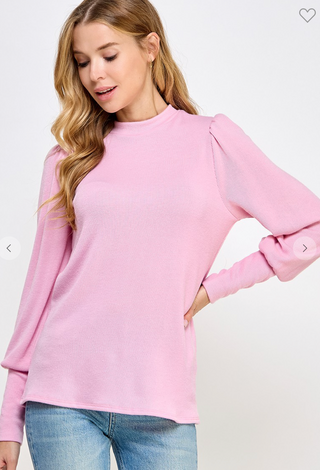 Soft pink ribbed mock neck long puff sleeves with fitted cuffs top