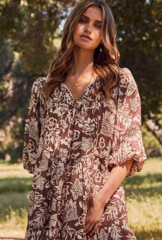 Brown and Cream floral boho babydoll mini dress with half sleeves and tassel wooden bead tie at neckline