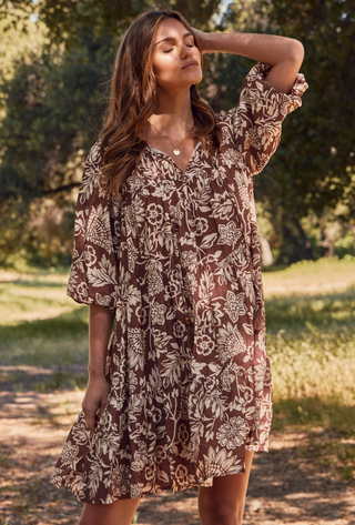 Brown and Cream floral boho babydoll mini dress with half sleeves and tassel wooden bead tie at neckline