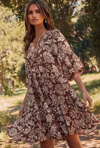 Brown and Cream floral boho babydoll mini dress with half sleeves and tassel wooden bead tie at neckline