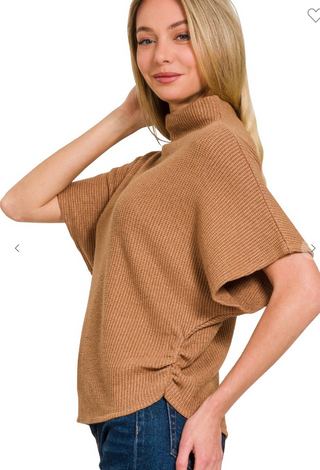 Goldenrod mock neck short sleeve knit sweater with side shirring. 