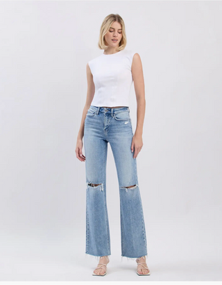 Flying Monkey High-Rise distressed wide leg jeans In light wash stretch denim