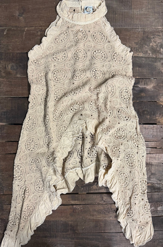 Boho Tunic in lightweight fabric with relaxed fit, mid-thigh length, side slits and subtle detailing along neckline and sleeves. 