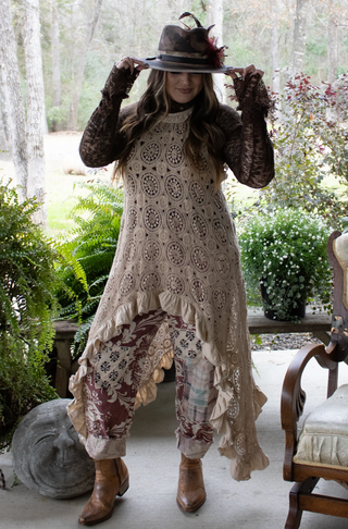 Boho Tunic in lightweight fabric with relaxed fit, mid-thigh length, side slits and subtle detailing along neckline and sleeves. 