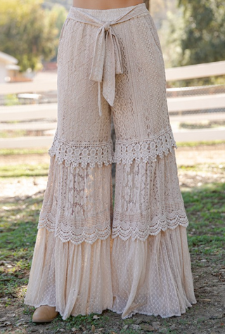 Wide leg tiered flow pants featuring lace and cotton voile mixed media with elastic waistband and full length boho silhouette