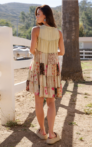 Patchwork tiered sleeveless jhabla tunic top with V neckline, relaxed fit, and hip length boho silhouette