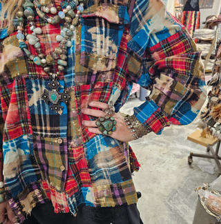 Oversized reversible patchwork flannel top with quilt inspired panels and royal zigzag stitching in multicolor fabric