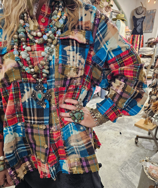 Oversized reversible patchwork flannel top with quilt inspired panels and royal zigzag stitching in multicolor fabric