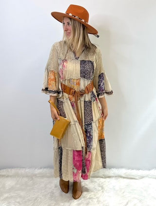 Long flowy boho dress with mixed patchwork fabric in a jhabla style silhouette, featuring relaxed fit and western inspired detailing