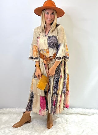 Long flowy boho dress with mixed patchwork fabric in a jhabla style silhouette, featuring relaxed fit and western inspired detailing