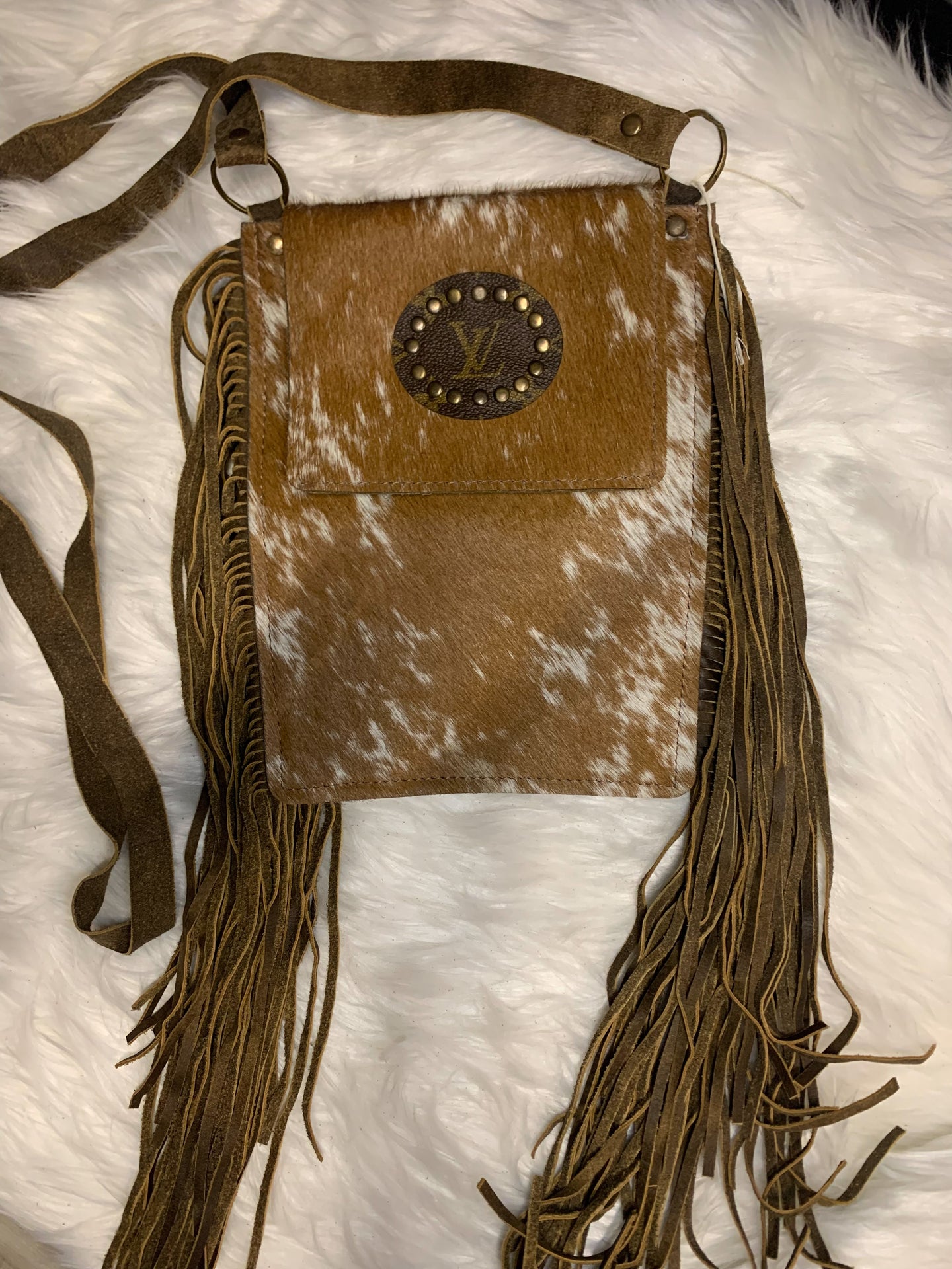 louis vuitton cowhide purse with fringe