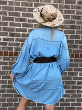 The Chambray Denim Dress features a light white wash denim with frayed hem details. Wear as a dress belted or oversized or wear open front as a long oversized denim jacket. Either way this is a Dress and denim color that compliments any spring wardrobe. The oversized sleeves could be worn full length or rolled for a cute 3/4 look, we can't forget the oversized pockets on this, we LOVE anything with pockets! We think this would pair best as a dress with tall boots, a belt and hat!