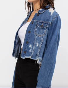 Everybody needs a basic light wash distressed cropped jacket. This jacket has button closures, light distressing all over and a distressed hemline. It is so easy to throw it on with about anything!!